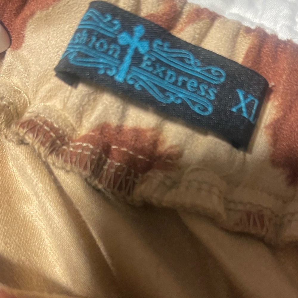 Fashion Express cow print fringe mini skirt - Picture 3 of 3